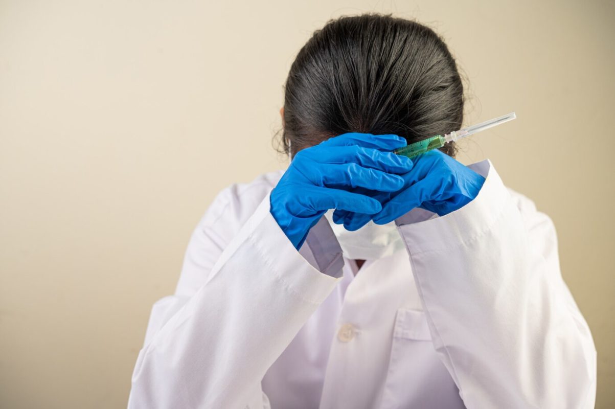 scientists wear gloves hold syringes then bend their heads 1150 20792 1203x800 - How Loud is Your Laboratory?